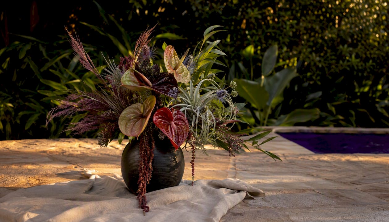 Masculine floral arrangement with bold flowers