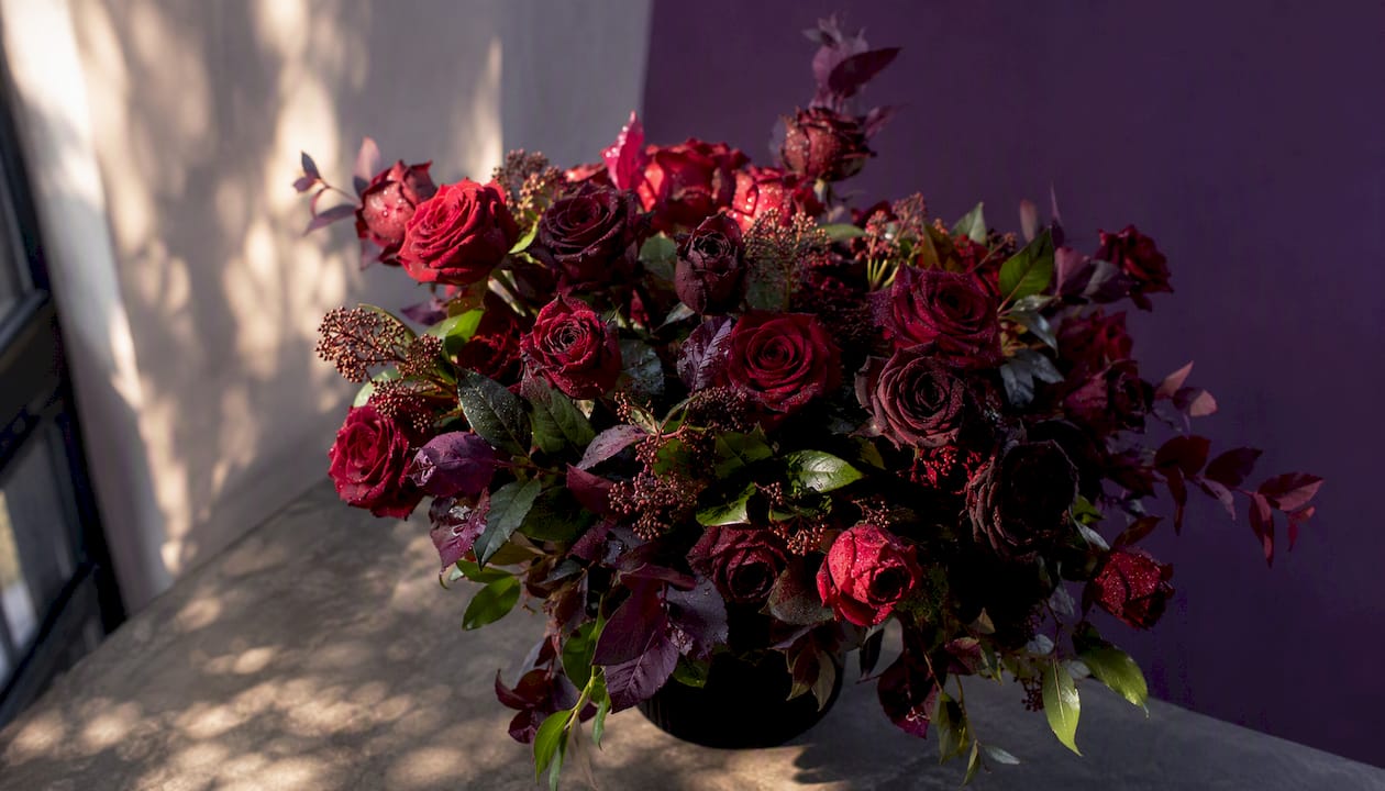 Bright and dark red roses bouquet