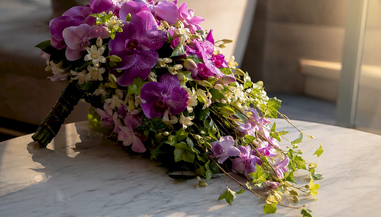 Orchid cascade wedding bouquet side view