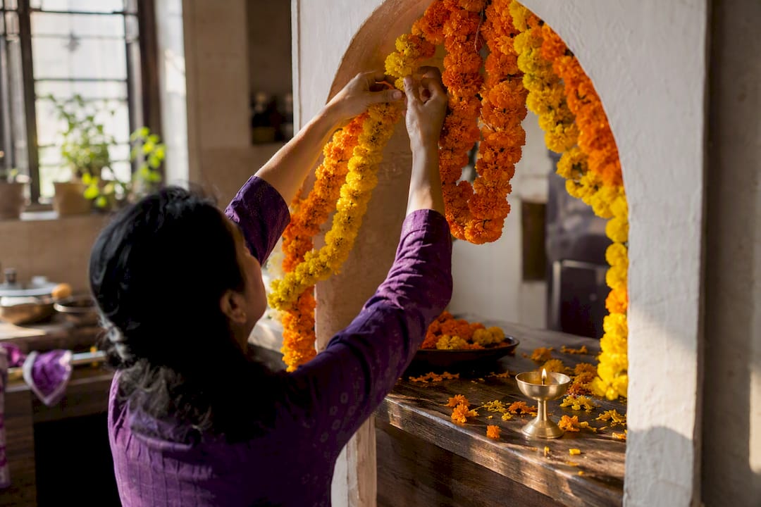 Fresh marigold garlands decorating doorway