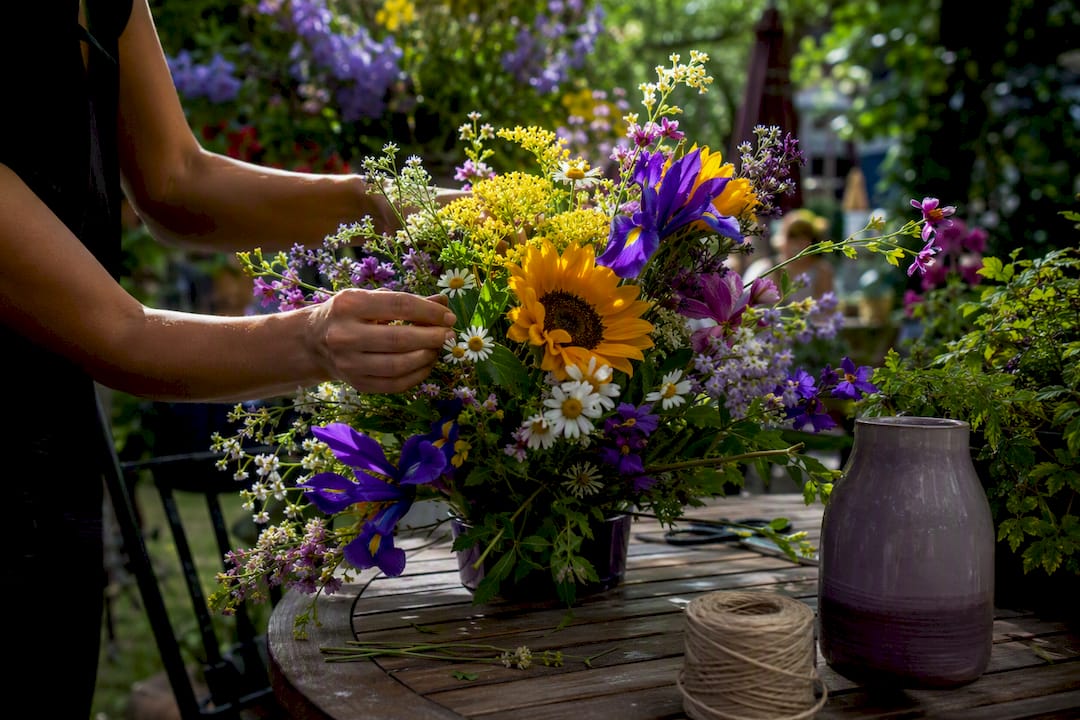 Freshly arranged birthday flower bouquet on table