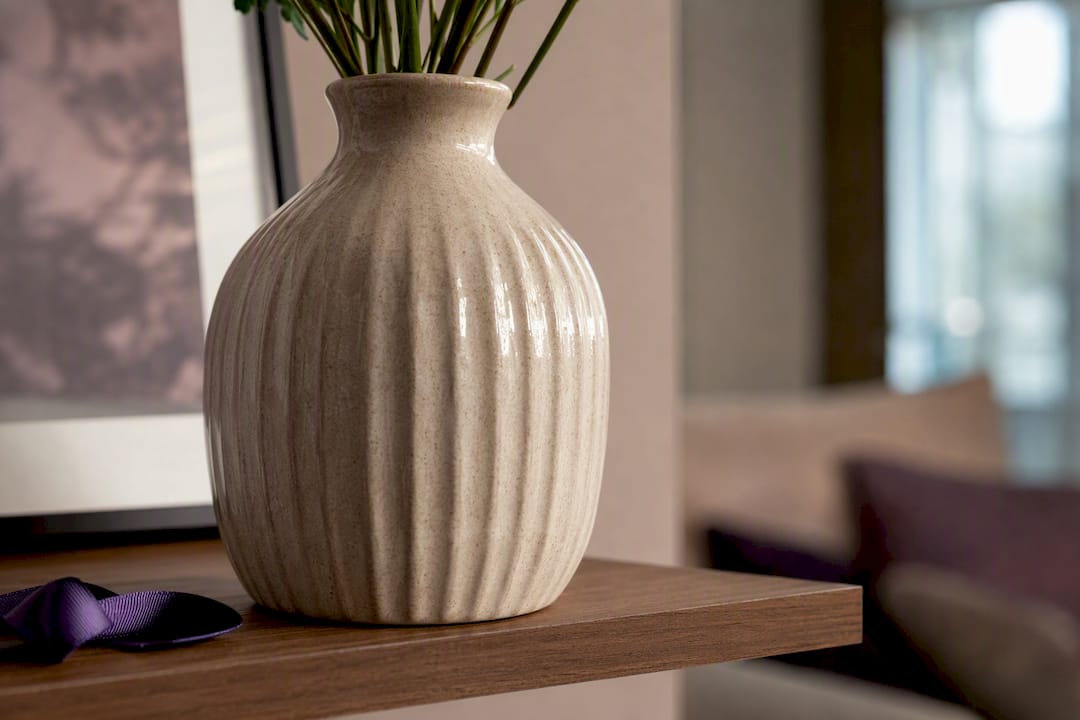Decorative vase with cropped flower stems