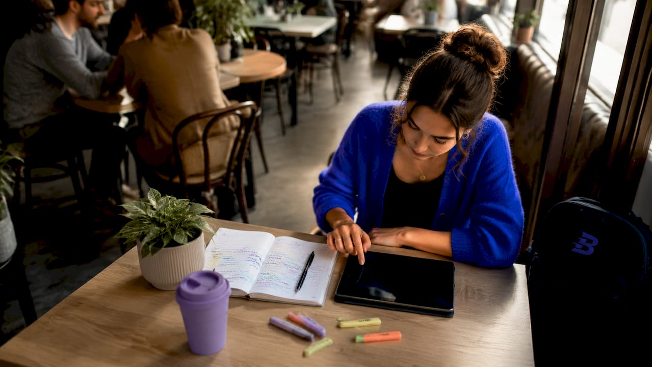 Solo tutor scheduling lessons on tablet