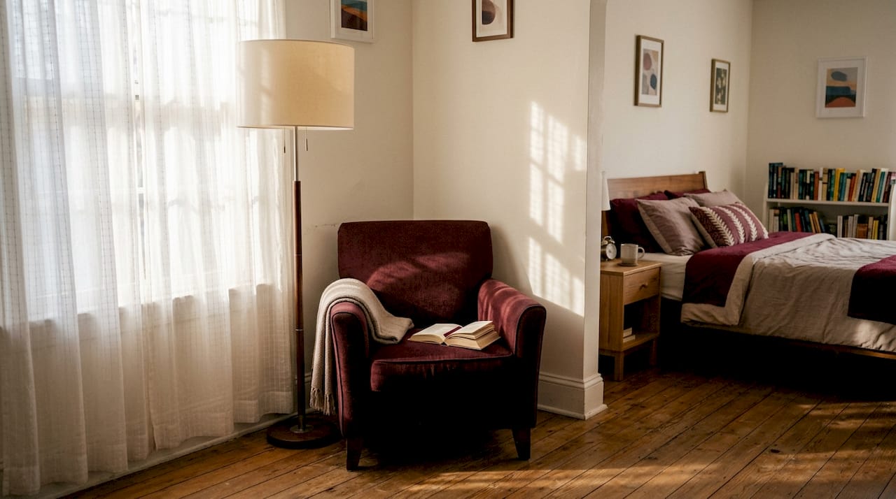 Close-up of lamp size next to mattress and nightstand