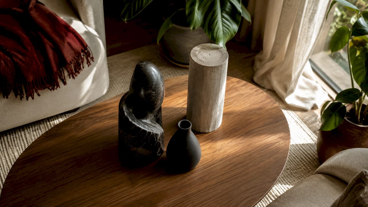 Cluster of three sculptures on coffee table