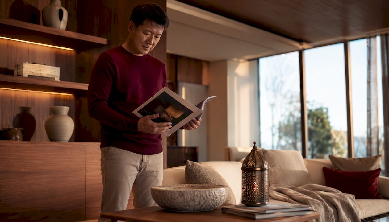 Man reviewing accent lighting catalog
