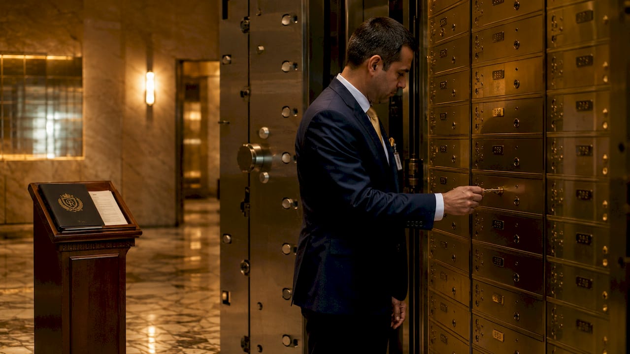 Bank vault aisle with safe deposit boxes