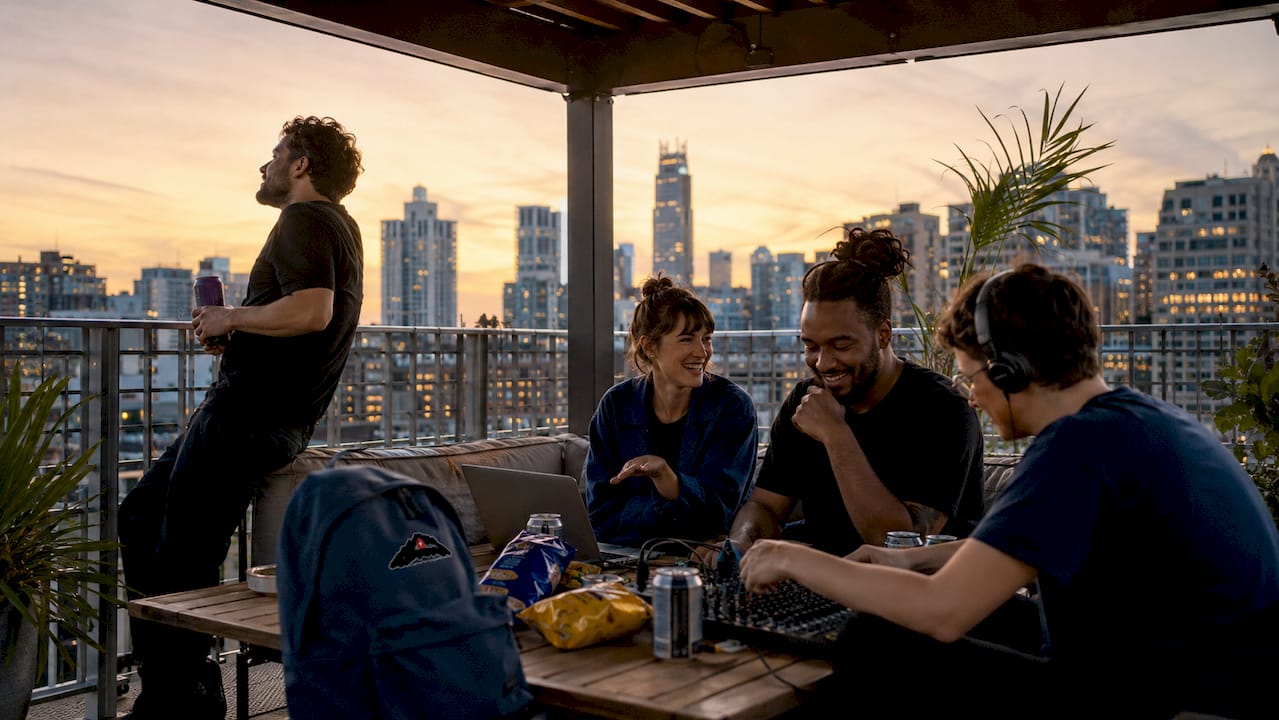 Crew relaxing in serviced apartment living area