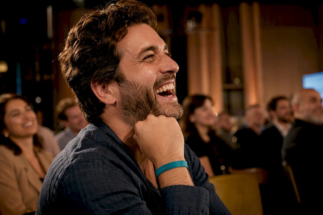 Attendee laughing during an event