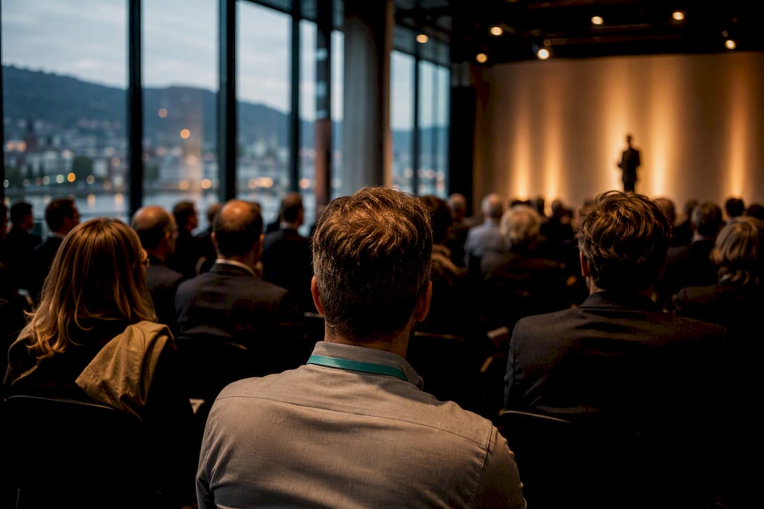 Audience watching a cinematic business event