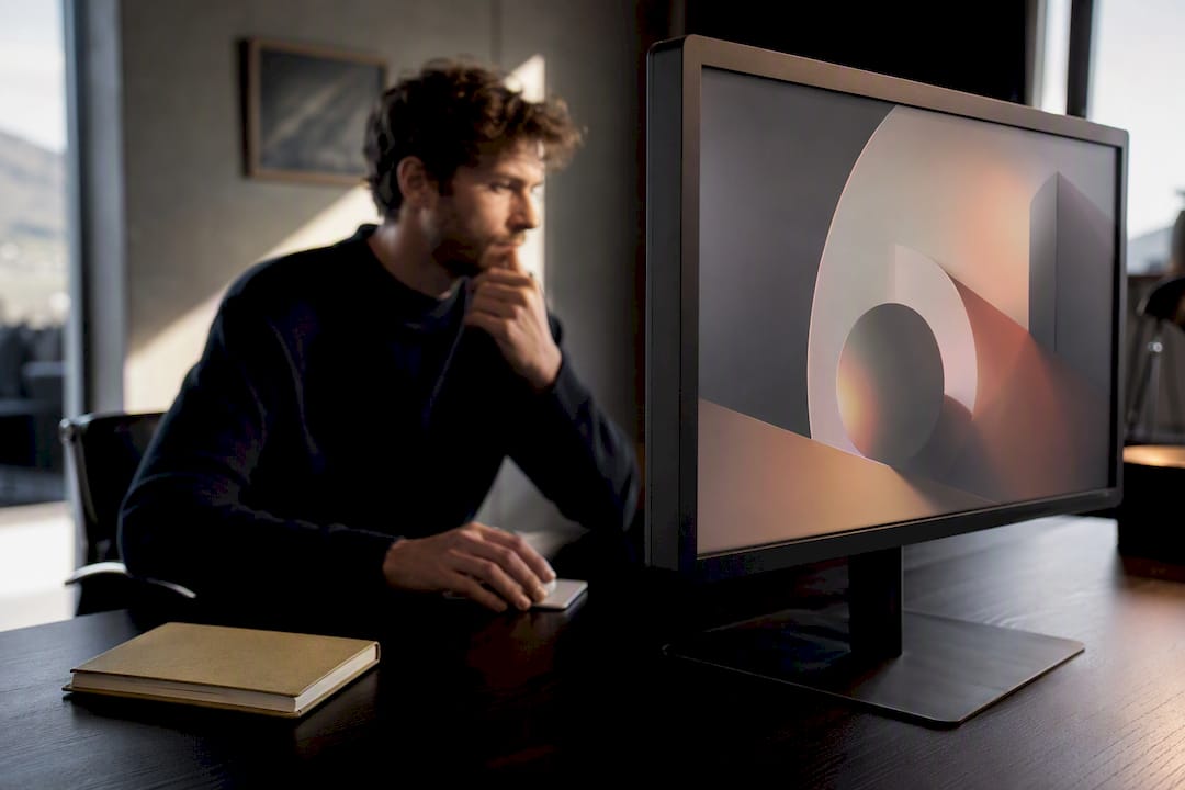 Motion designer reviewing logo animation sequence