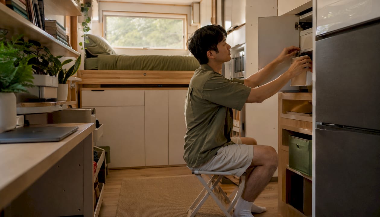 Compact tiny home interior with storage