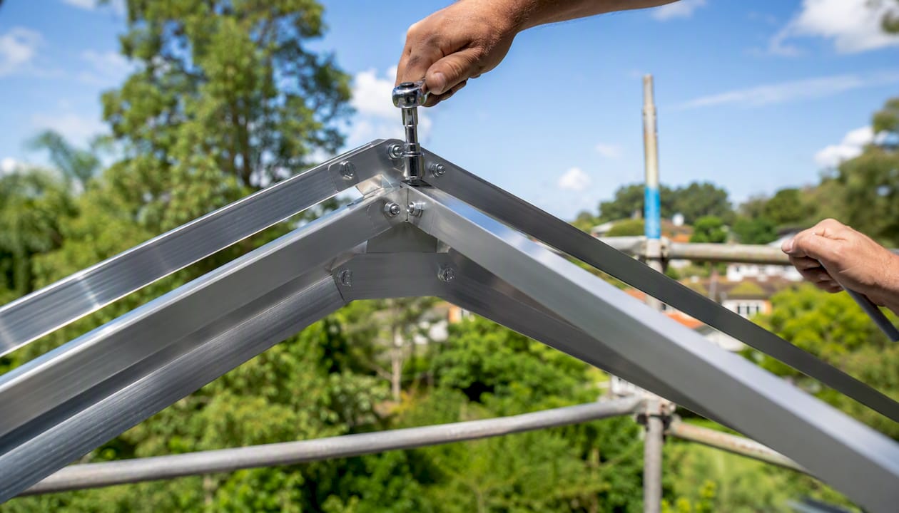 Manual frame assembly with scaffold and wrench