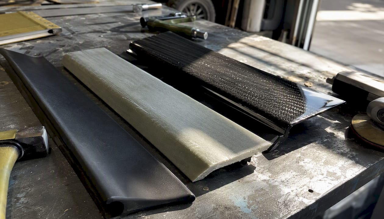 Fiberglass, carbon fiber, polyurethane panels close-up