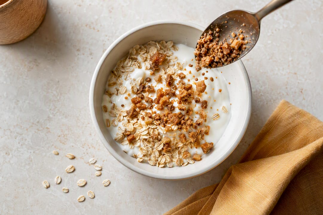 Toffee crumble sprinkled over yogurt oats