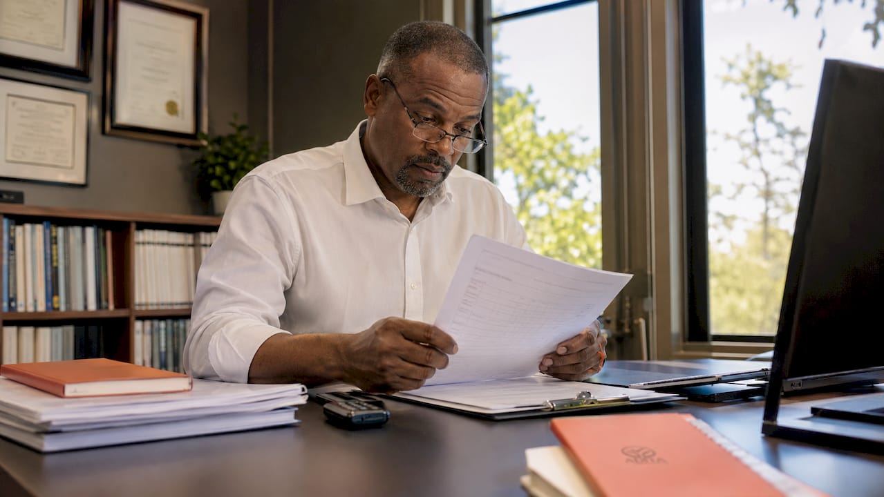 Psychologist reviewing anxiety evaluation documents
