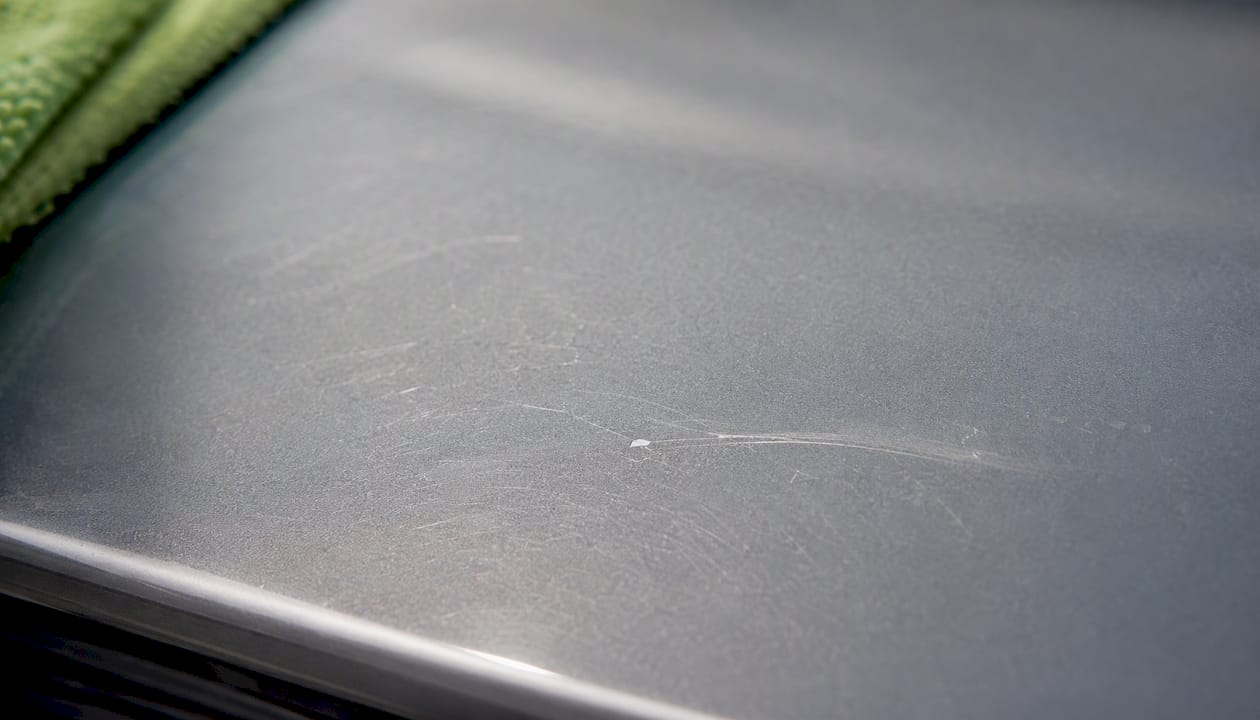Close-up of surface damage on paint protection film
