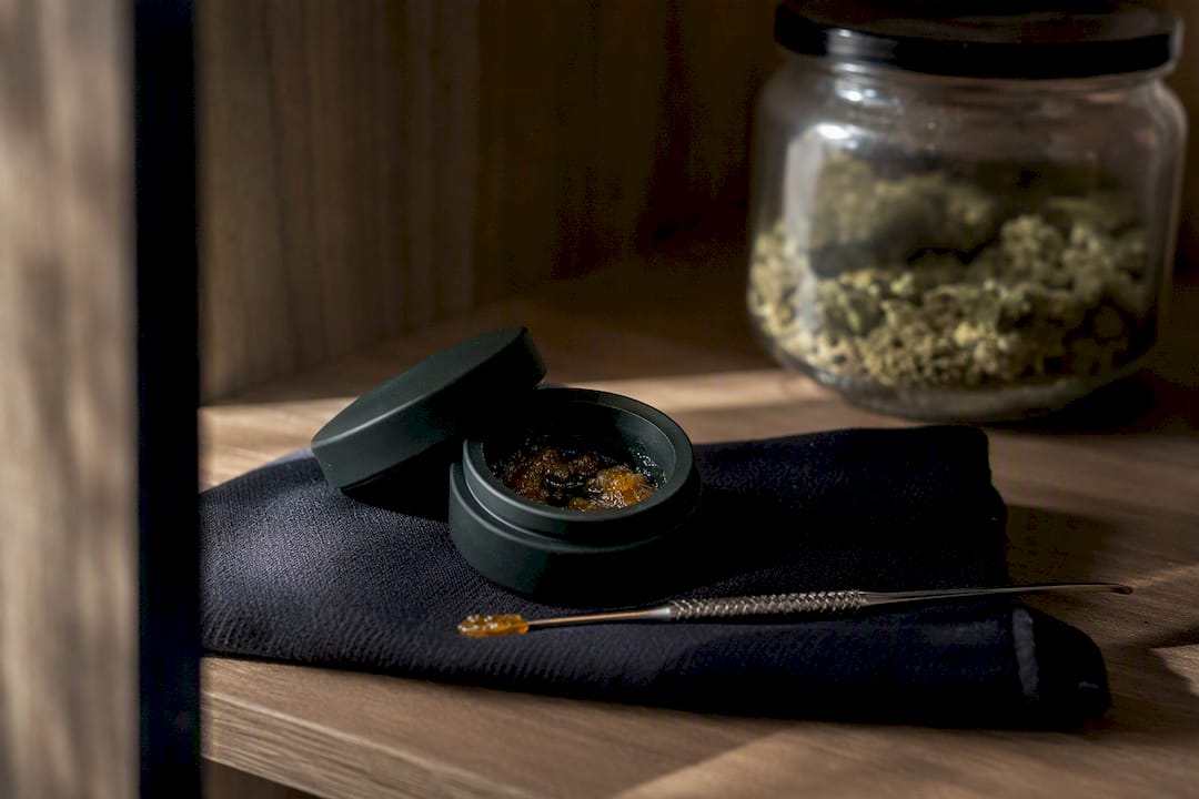 Cannabis concentrate storage container with dab tool