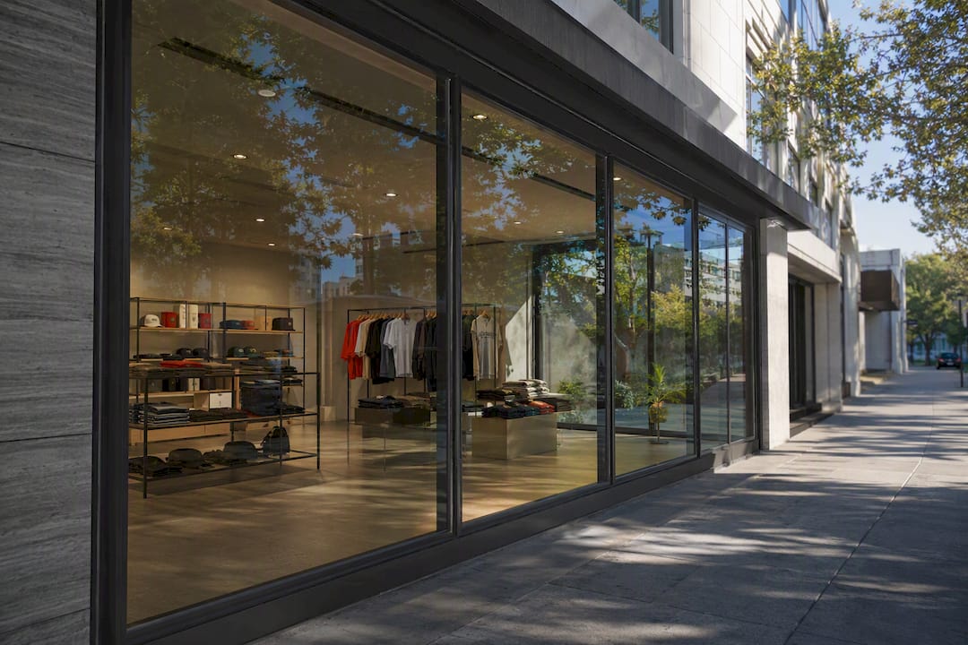 Retail window with clear view through spectrally-selective film