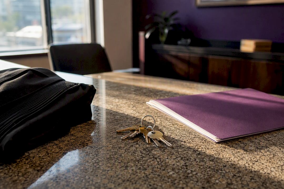 Handcuffs and keys on legal folder