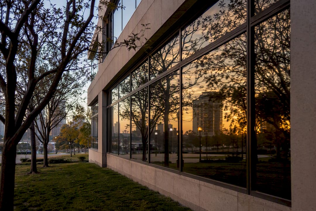 Window with daytime reflective privacy film