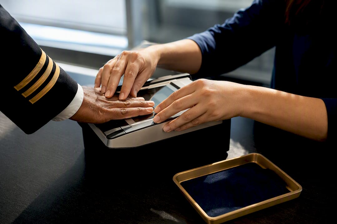 Pilot completing approved fingerprint collection