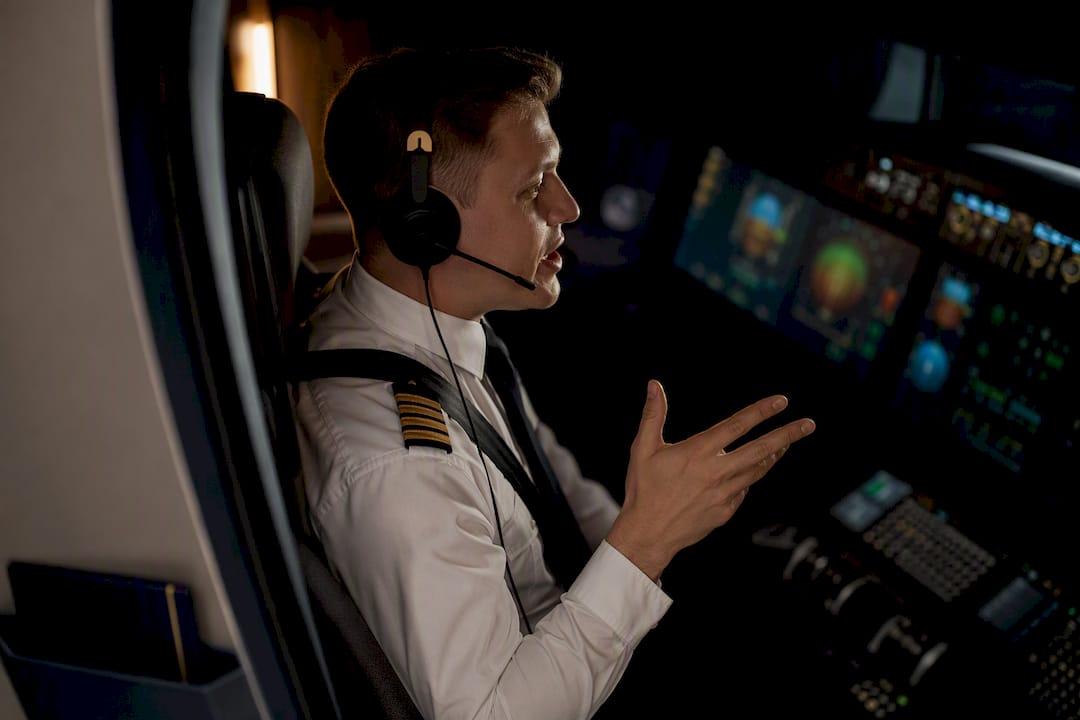 Pilot managing an airline simulator assessment