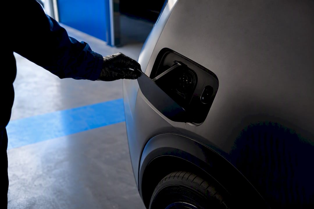 Anonymous EV charging port in appraisal bay