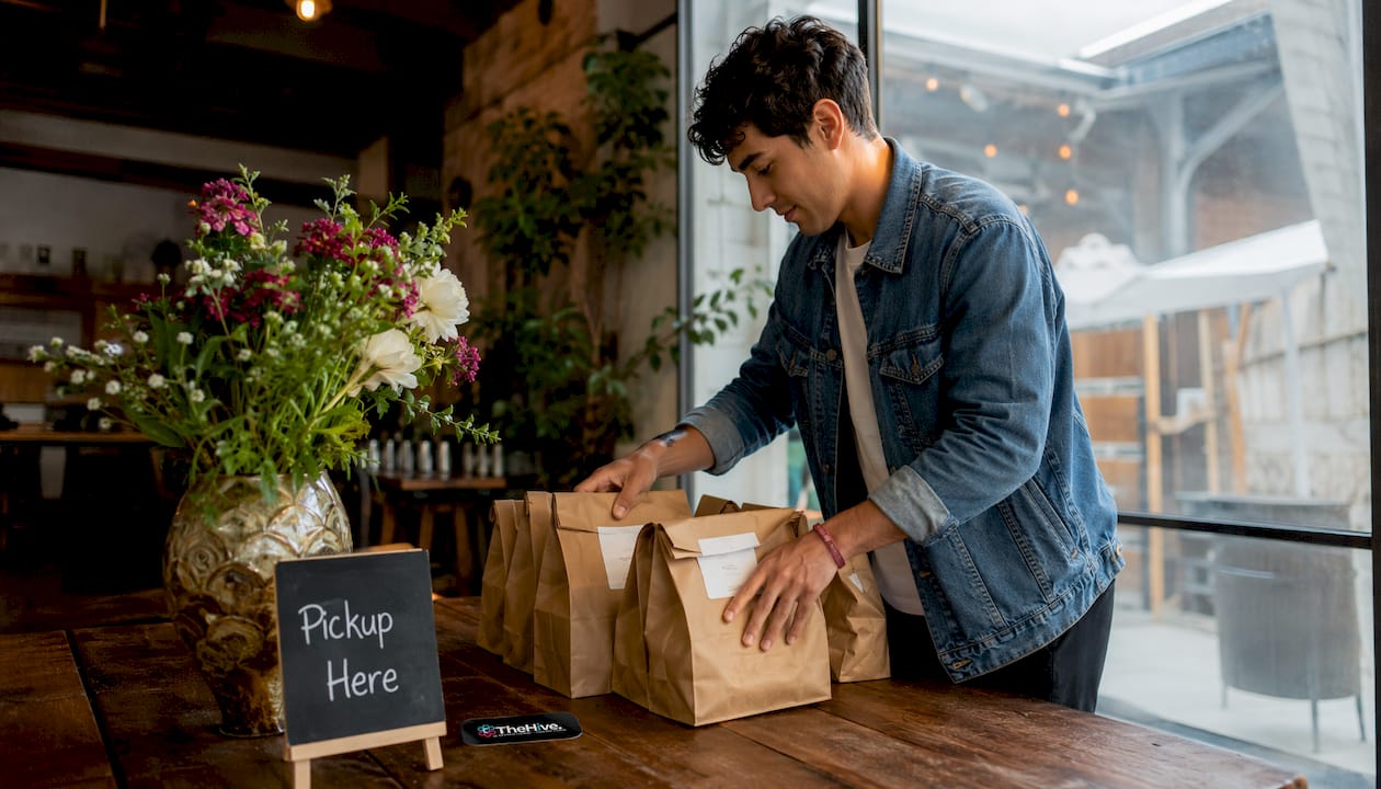 Shop owner preparing same-day pickup orders