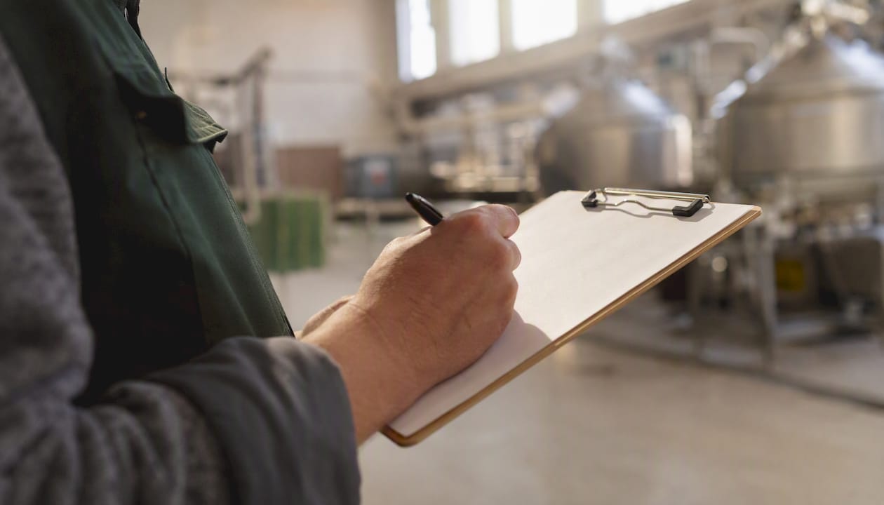 Operator hand writing downtime notes