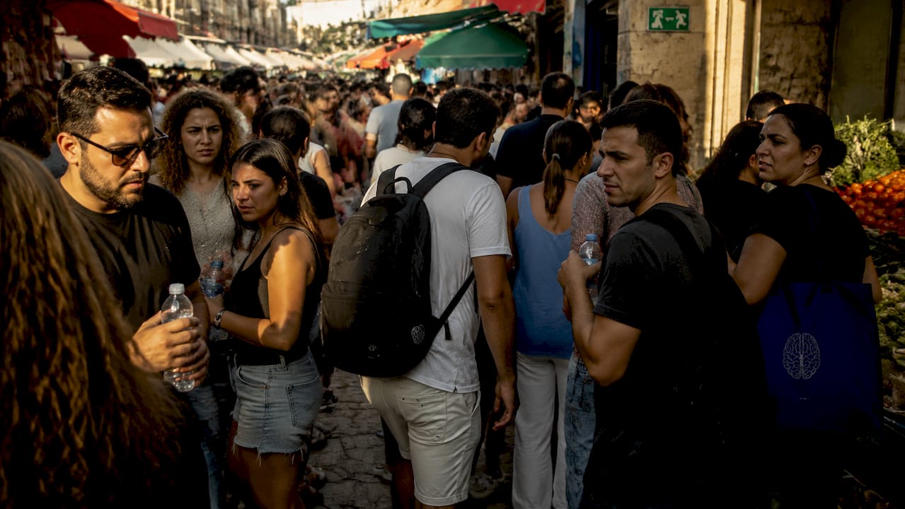 Overhead dense crowd at urban festival event
