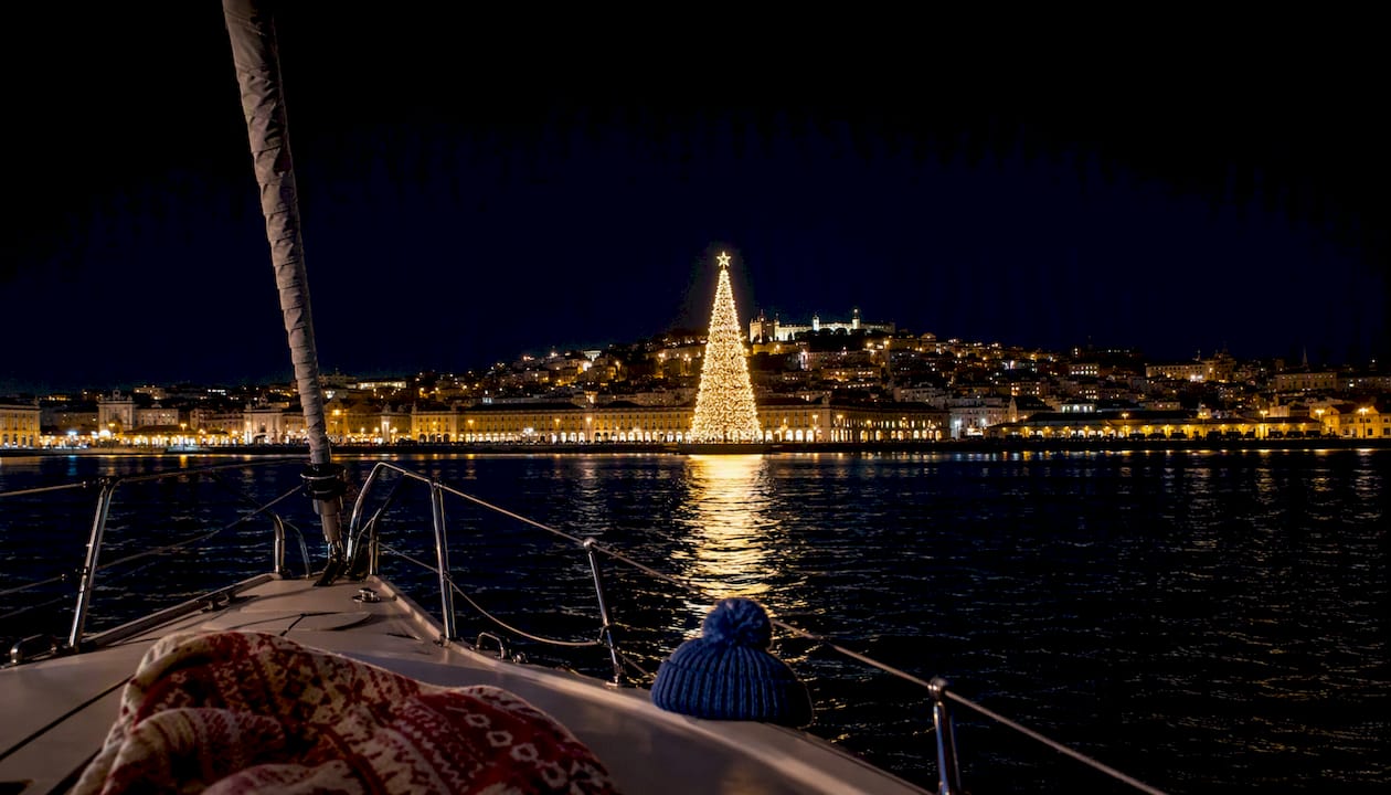Christmas tree and Lisbon waterfront from boat deck