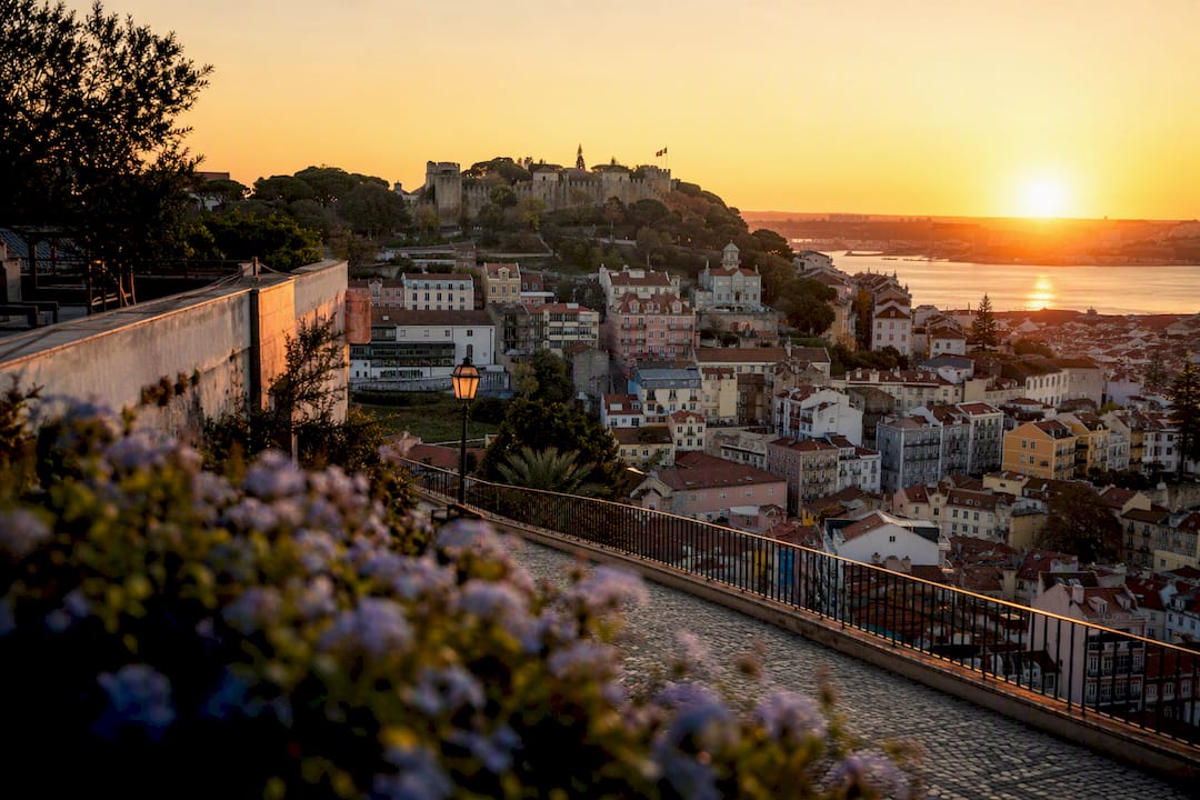 Sunset view over Lisbon city and river
