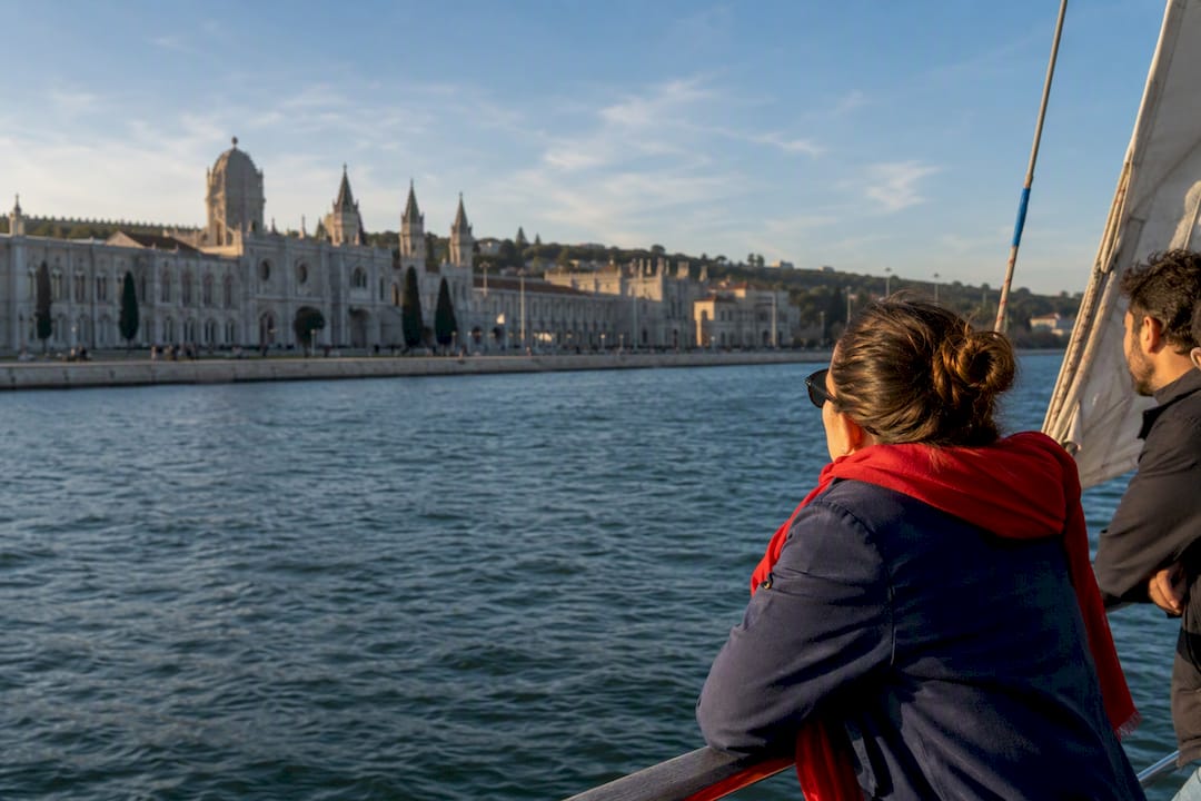 Passengers viewing Lisbon from the Tagus