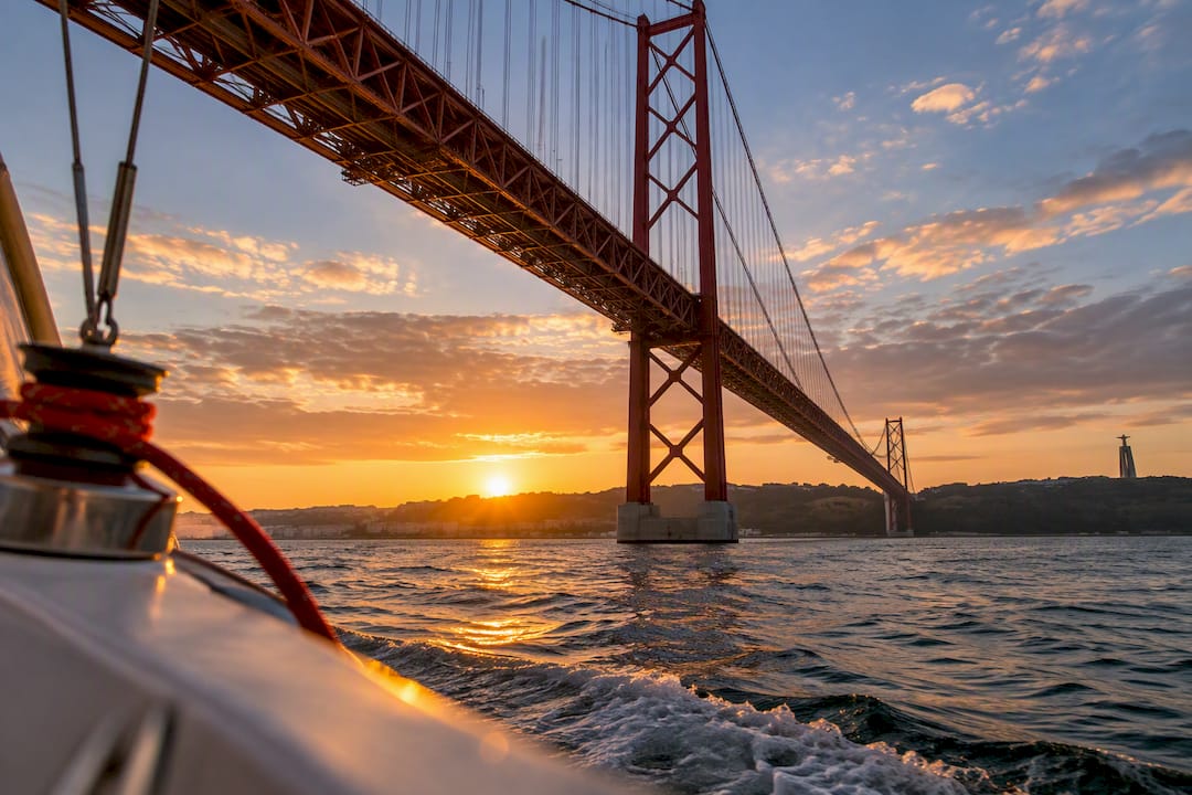 Sailing beneath Lisbon’s 25 de Abril Bridge