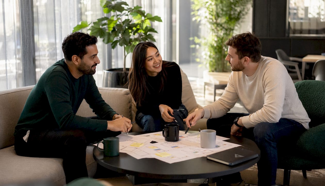Business team planning website redesign in office
