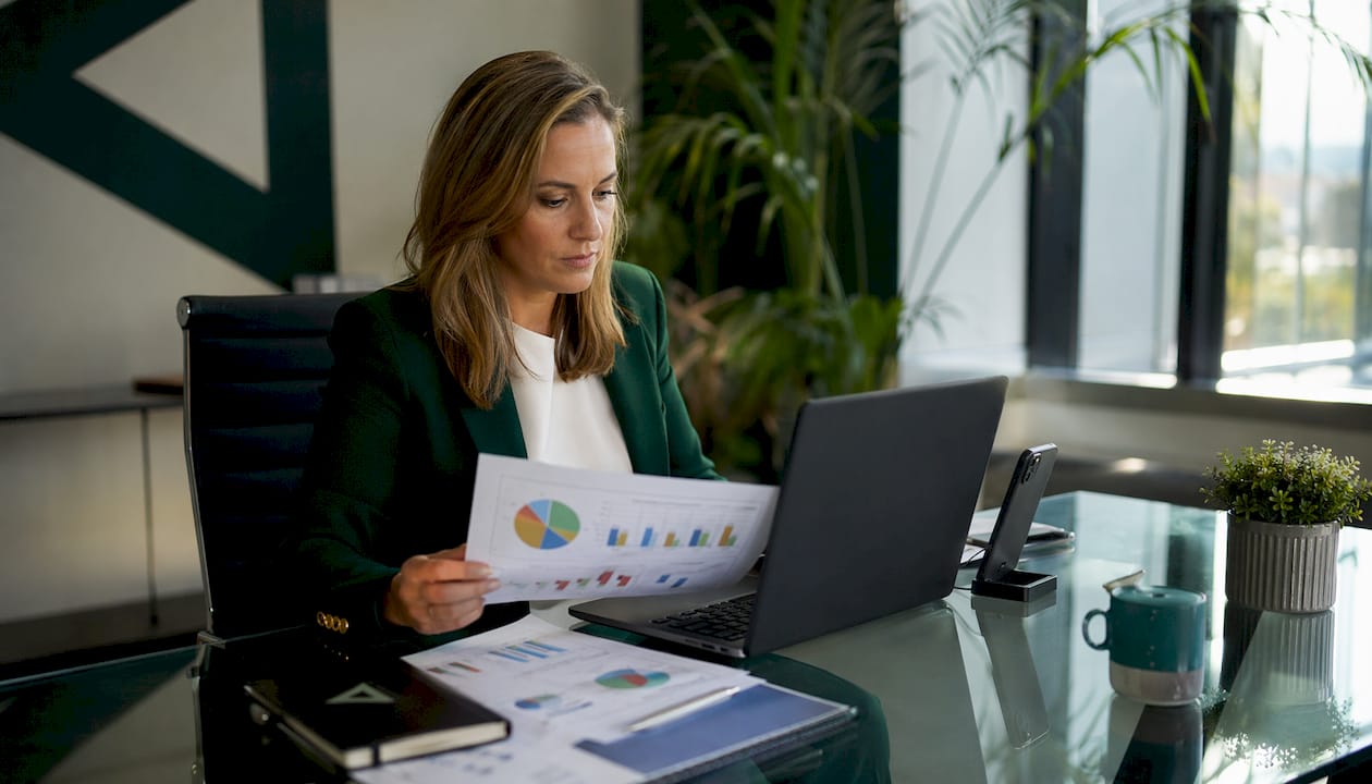 Business owner analyzing SEO data at desk