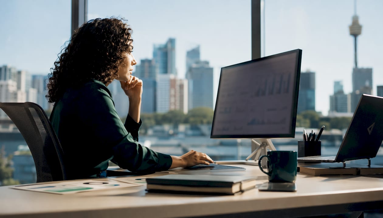 Professional woman working on SEO tools in office