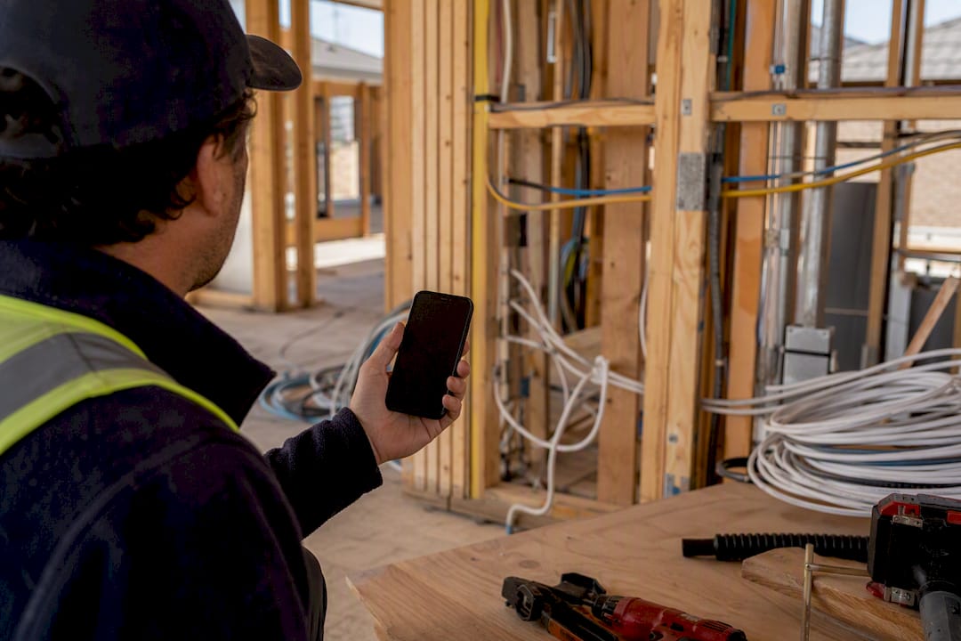 Builder coordinating smart home prewire on site