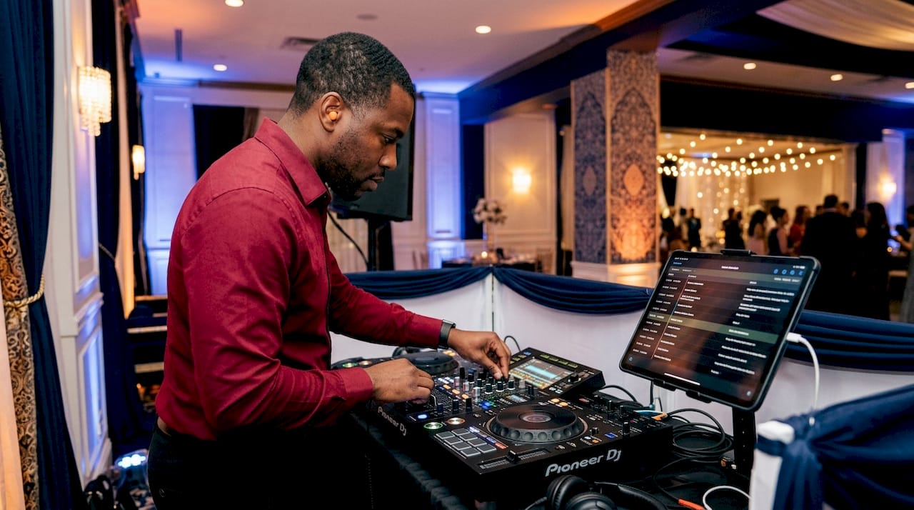 DJ adjusting mixer with timeline clipboard