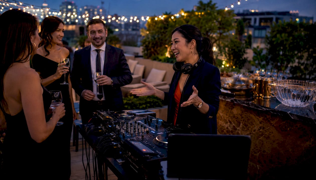 Female DJ hosting VIP event in lounge