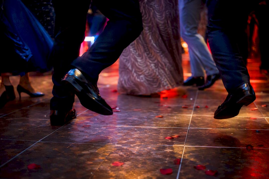 Dancing feet on wooden floor