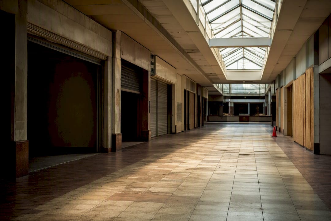 Vacant mall corridor after shopping center closure