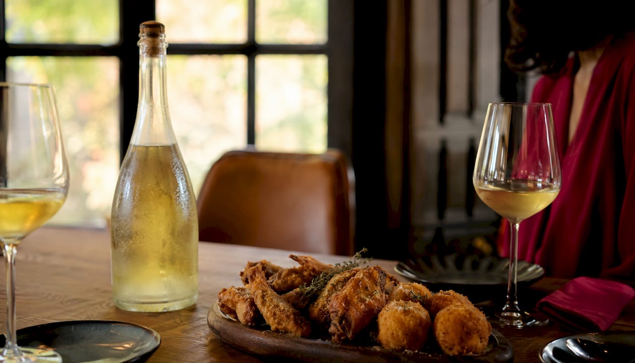 Easy Ways to Pair Natural Wines with Your Favorite Dishes Sparkling natural wine with fried chicken and croquettes