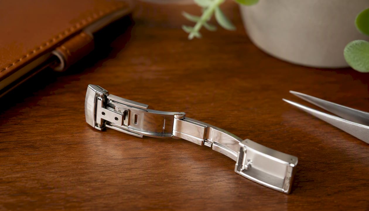 Macro of luxury watch clasp quality inspection