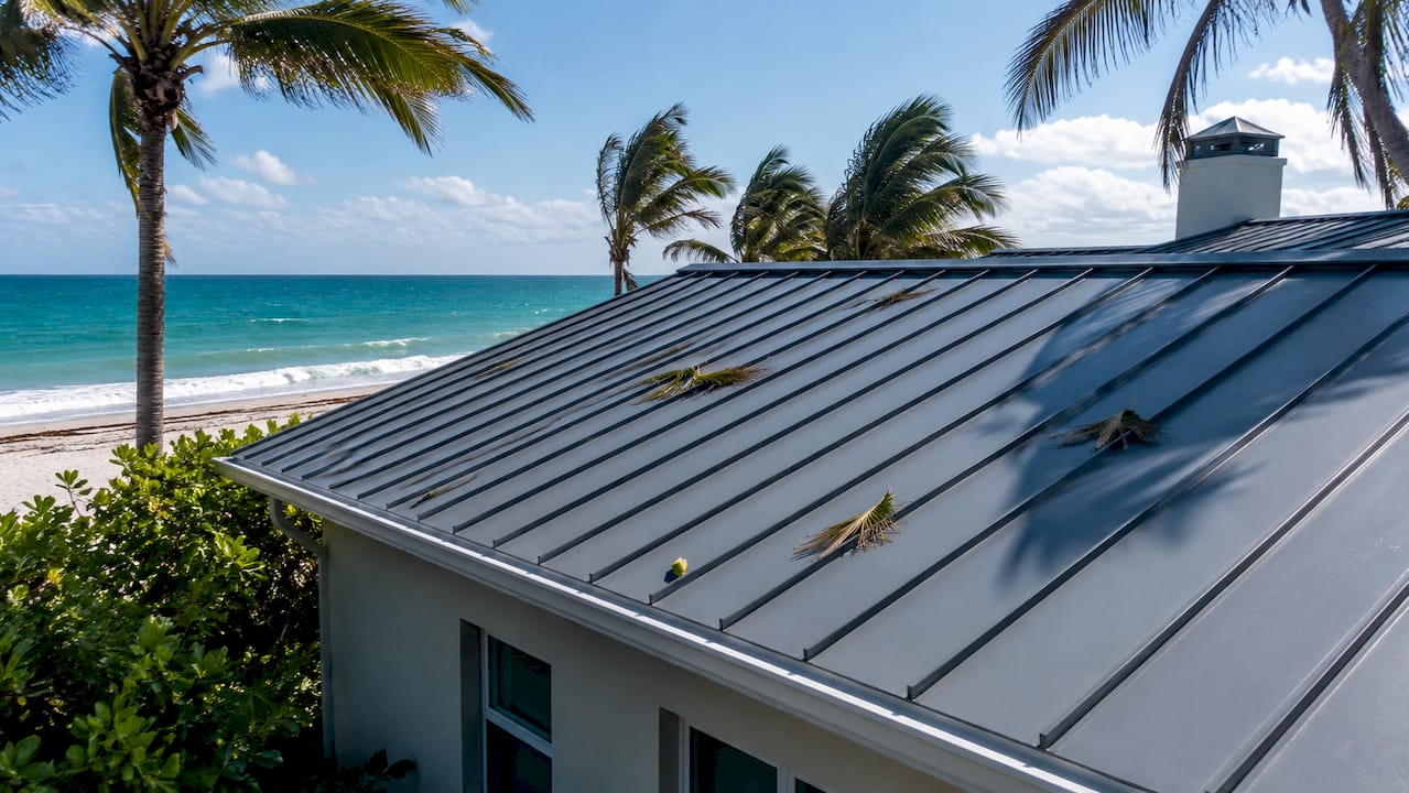Close-up standing seam metal roof after hurricane