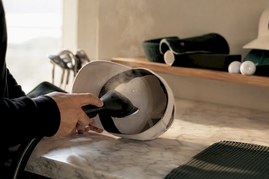 Careful steaming of hat's brim underside