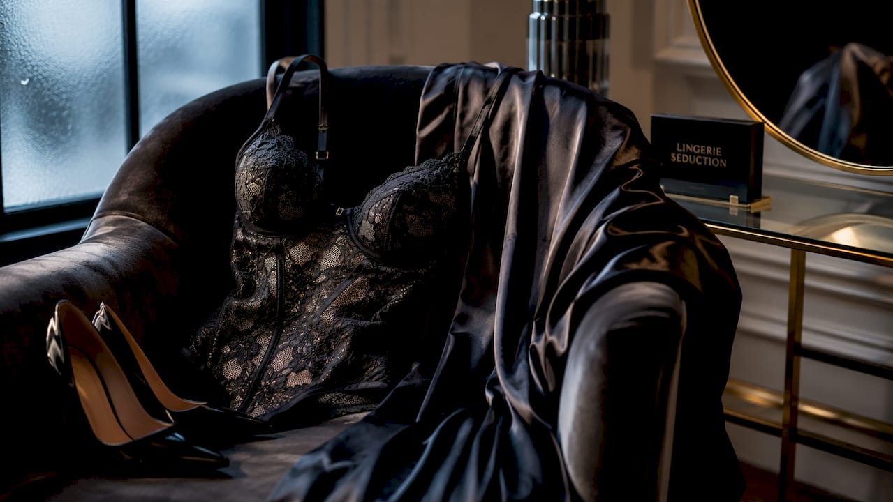 Black lace crotchless bodysuit with styling accessories