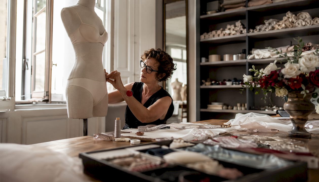 Seamstress fitting seamless bridal lingerie