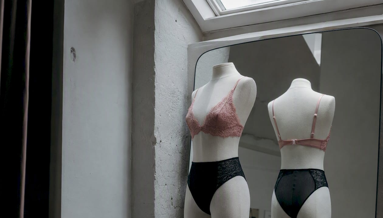 Mannequin torsos showing varied lingerie silhouettes and fabrics